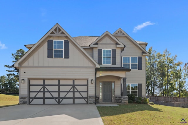 craftsman-style house with a front lawn and a garage