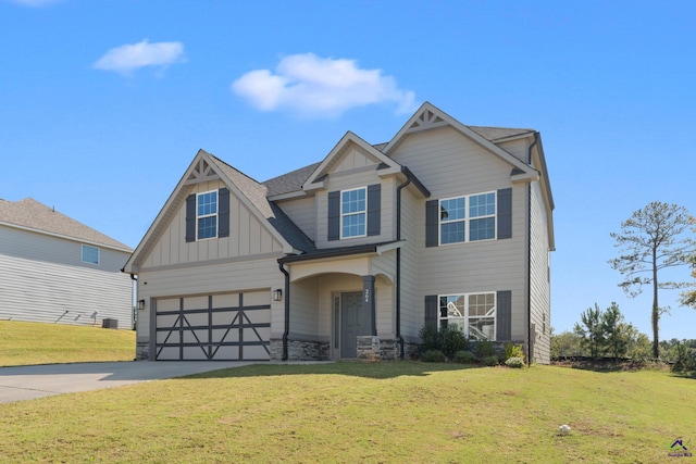 craftsman inspired home with a front lawn and a garage