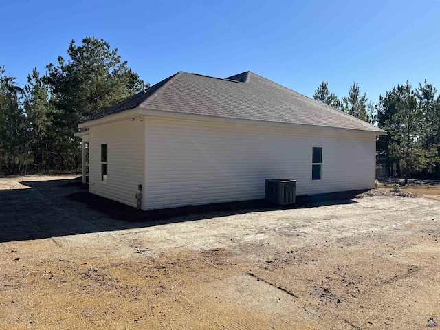 view of property exterior featuring central AC