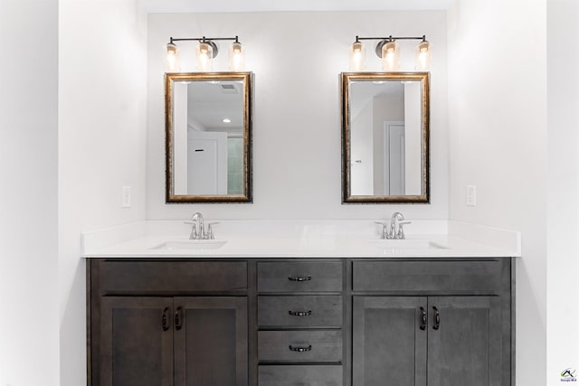 bathroom featuring double vanity and a sink