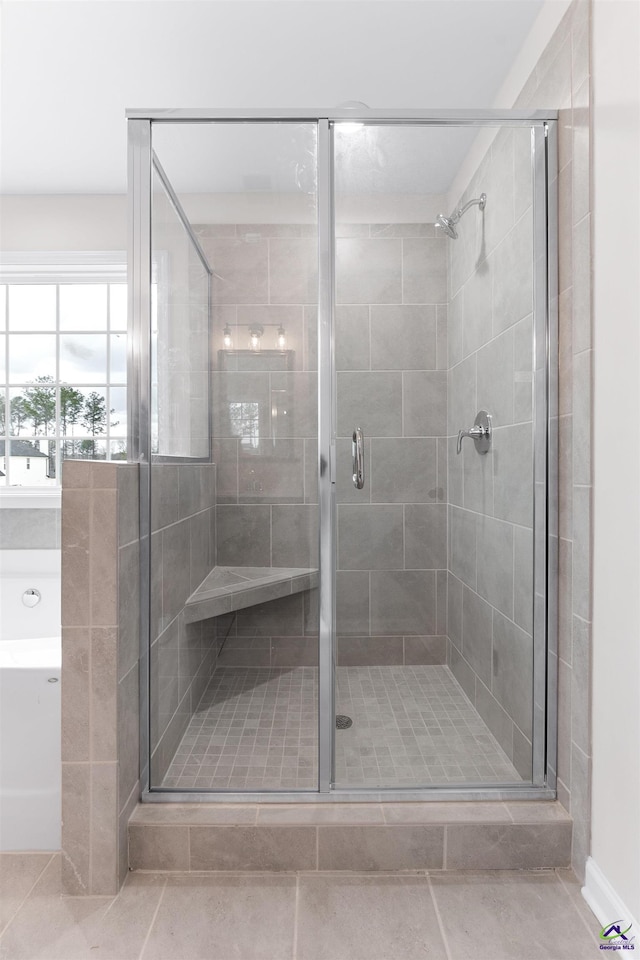 bathroom with a stall shower