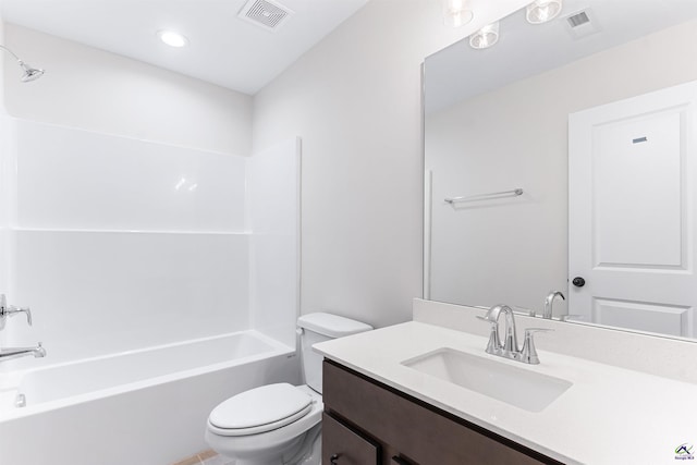 full bathroom with toilet, washtub / shower combination, visible vents, and vanity