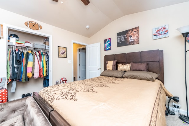 bedroom with a closet, ceiling fan, carpet, and lofted ceiling