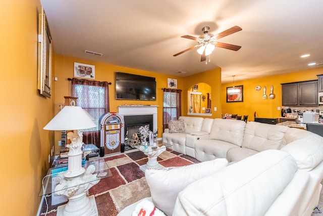 living room with ceiling fan