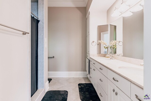 bathroom with vanity, a shower with curtain, and tile patterned flooring