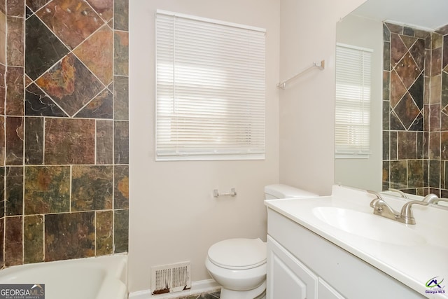 full bathroom featuring toilet, shower with separate bathtub, a healthy amount of sunlight, and vanity