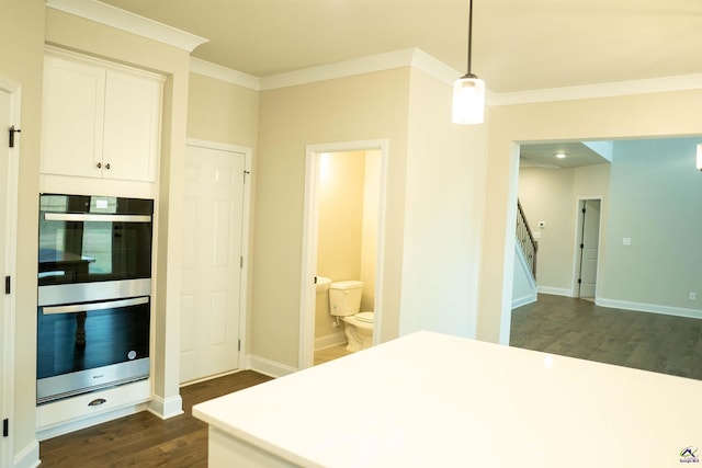 bathroom featuring baseboards, tile patterned flooring, and toilet