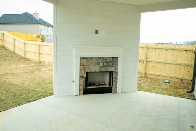 view of patio featuring french doors and a gate
