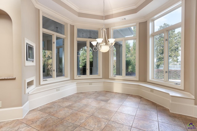 unfurnished sunroom featuring an inviting chandelier