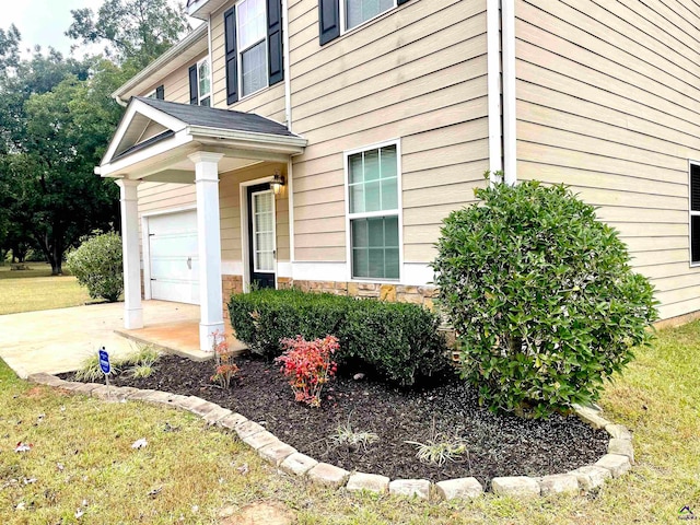 view of property exterior with a yard