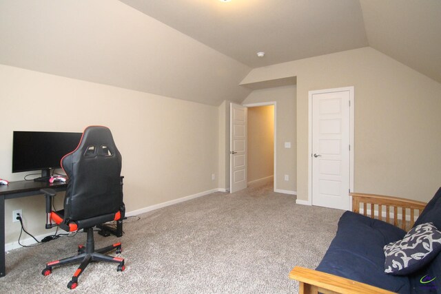 office featuring carpet and vaulted ceiling