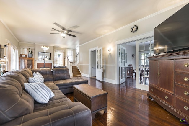 429 N Dooly St, Montezuma, GA 31063 - living area featuring ceiling fan, crown molding, healthy amount of natural light, dark wood-style flooring, and stairway