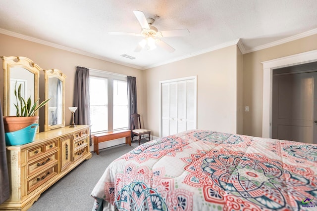 carpeted bedroom featuring crown molding, a textured ceiling, a closet, and ceiling fan