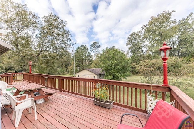 wooden deck with a storage unit