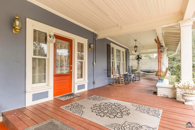 wooden deck featuring covered porch