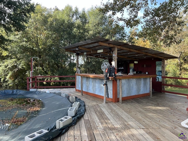 wooden terrace with exterior bar