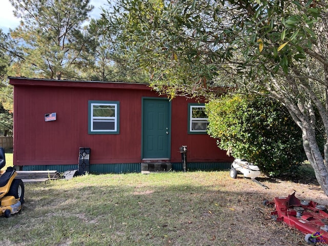 exterior space with a front lawn