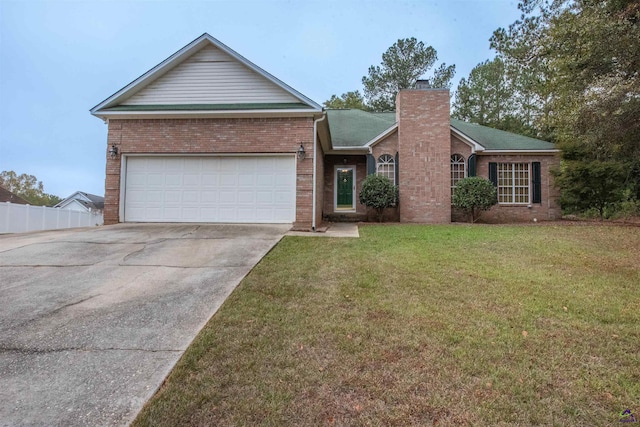 ranch-style home featuring a front yard and a garage