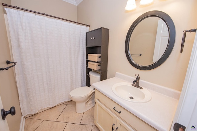 bathroom with vanity, toilet, curtained shower, and tile patterned flooring