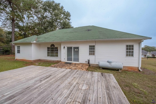 exterior space featuring a deck and a yard