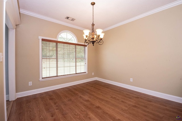 unfurnished room with ornamental molding, a notable chandelier, and dark hardwood / wood-style flooring