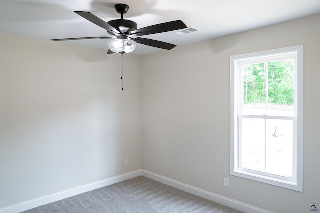 100 Saraland Trl, Perry, GA 31069 - empty room with light carpet, baseboards, and a ceiling fan