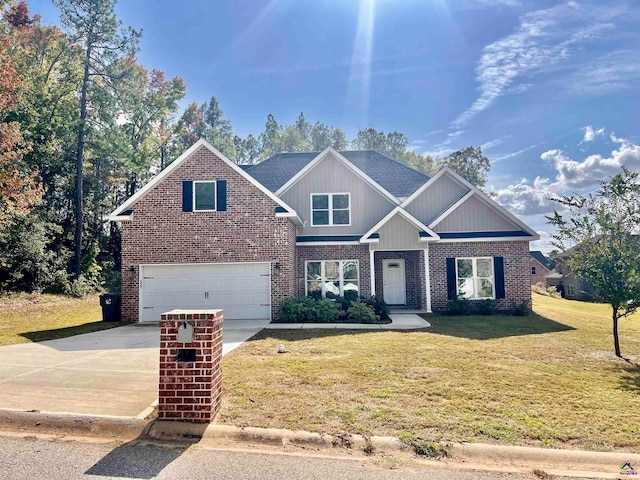 view of front of house with a garage and a front lawn