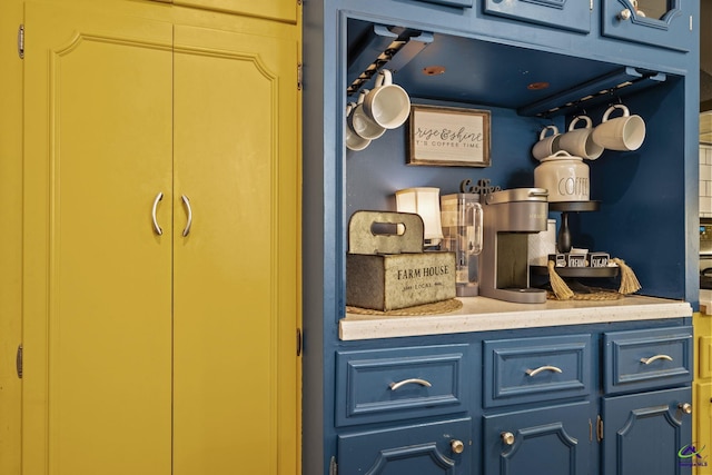 interior space with blue cabinets