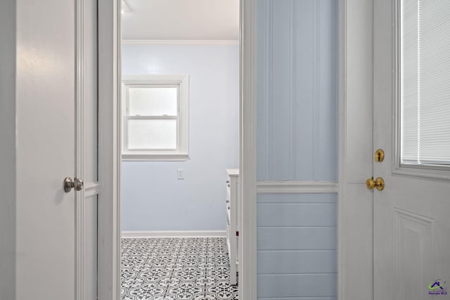 interior space with crown molding