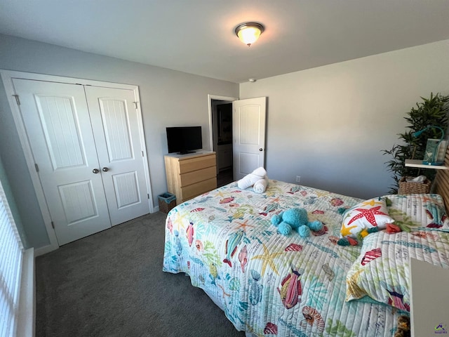 carpeted bedroom with a closet