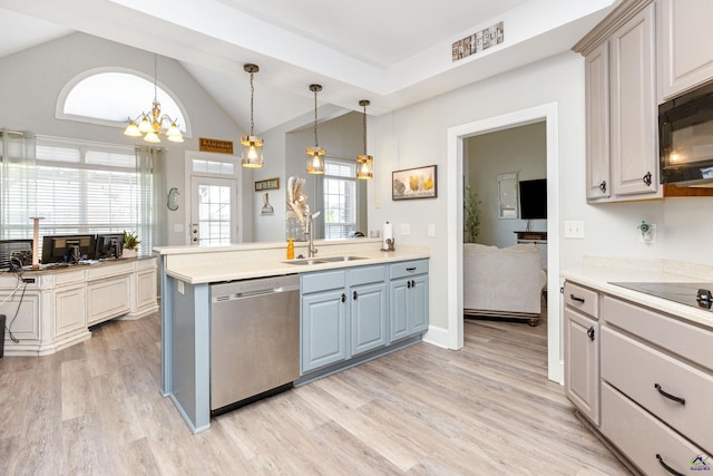 kitchen with light wood-type flooring, hanging light fixtures, sink, dishwasher, and lofted ceiling