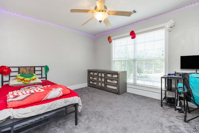 carpeted bedroom featuring ceiling fan