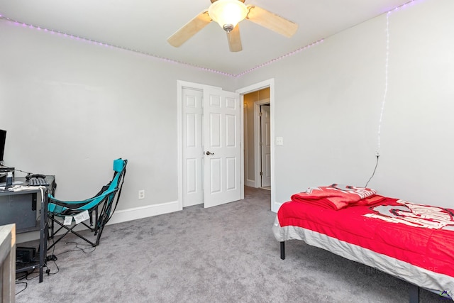 carpeted bedroom with ceiling fan