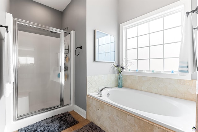 bathroom with independent shower and bath