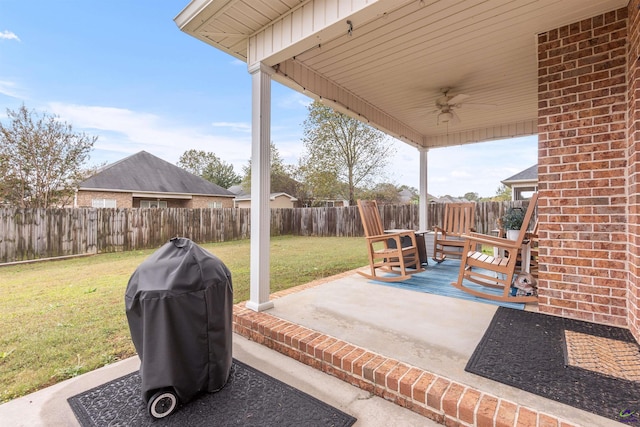 view of patio / terrace with ceiling fan and grilling area