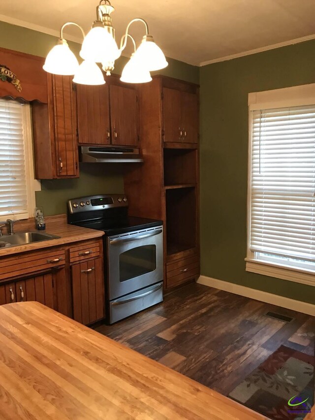 210 Anderson Ave, Fort Valley, GA 31030 - kitchen featuring stainless steel range with electric stovetop, a sink, under cabinet range hood, ornamental molding, and a chandelier