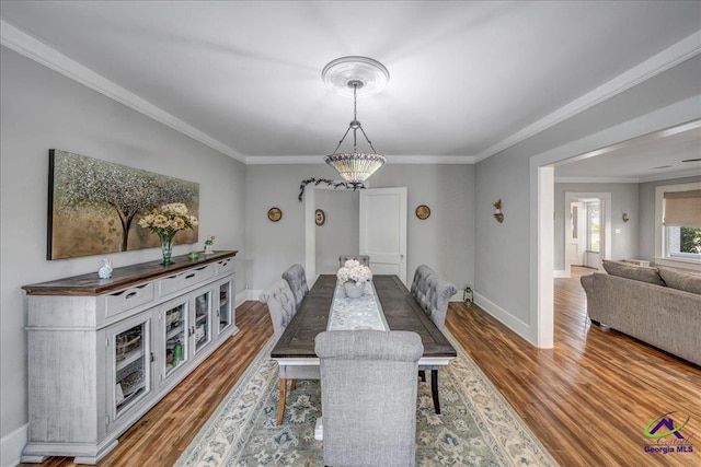 505 Engram St, Montezuma, GA 31063 - dining space with wood finished floors and ornamental molding
