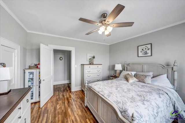 505 Engram St, Montezuma, GA 31063 - bedroom featuring crown molding, dark wood-type flooring, and ceiling fan