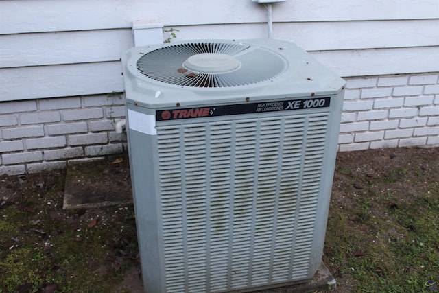 505 Engram St, Montezuma, GA 31063 - exterior view of a central AC unit and crawl space