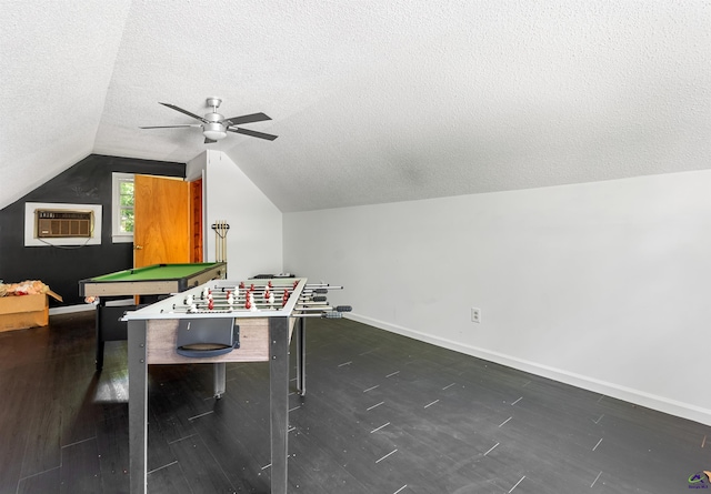 game room featuring ceiling fan, an AC wall unit, a textured ceiling, lofted ceiling, and pool table