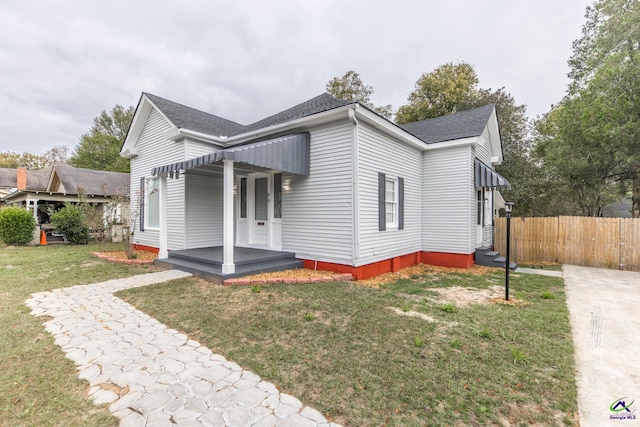 exterior space featuring a front lawn