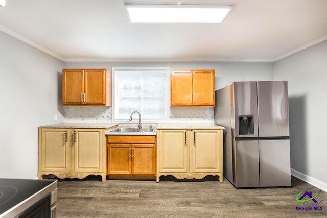 kitchen with tasteful backsplash, dark hardwood / wood-style flooring, stainless steel fridge with ice dispenser, and sink