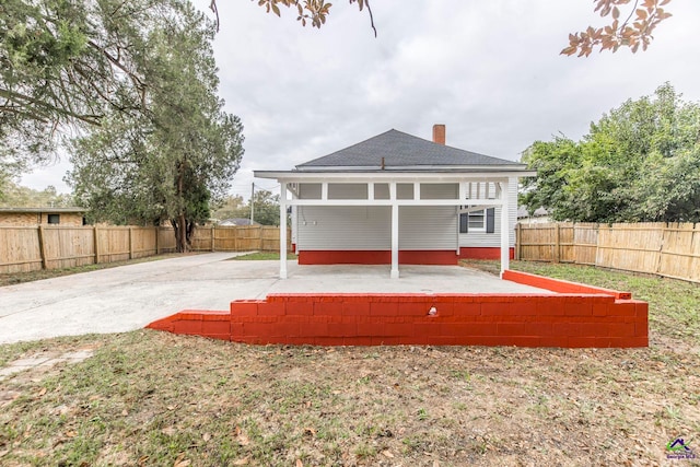 back of house featuring a patio