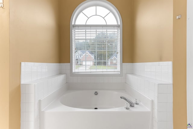 bathroom featuring a tub