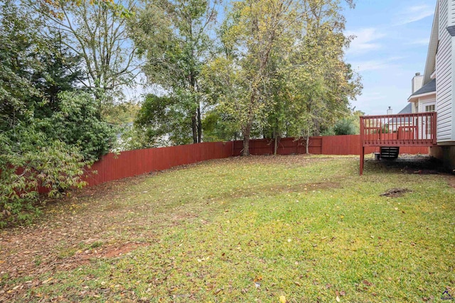 view of yard featuring a deck