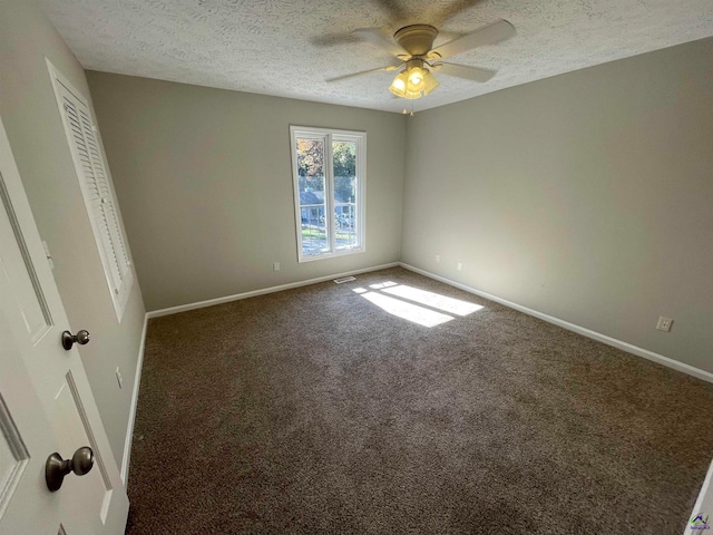 interior space featuring carpet flooring, a textured ceiling, a closet, and ceiling fan