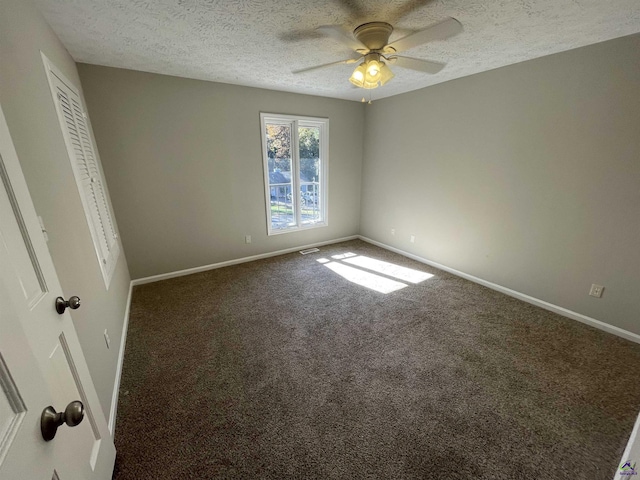 202 Lake Front Dr, Warner Robins, GA 31088 - unfurnished bedroom featuring baseboards, a textured ceiling, carpet, a ceiling fan, and a closet
