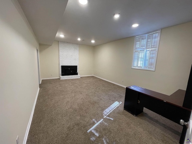202 Lake Front Dr, Warner Robins, GA 31088 - basement with carpet, recessed lighting, baseboards, and a brick fireplace