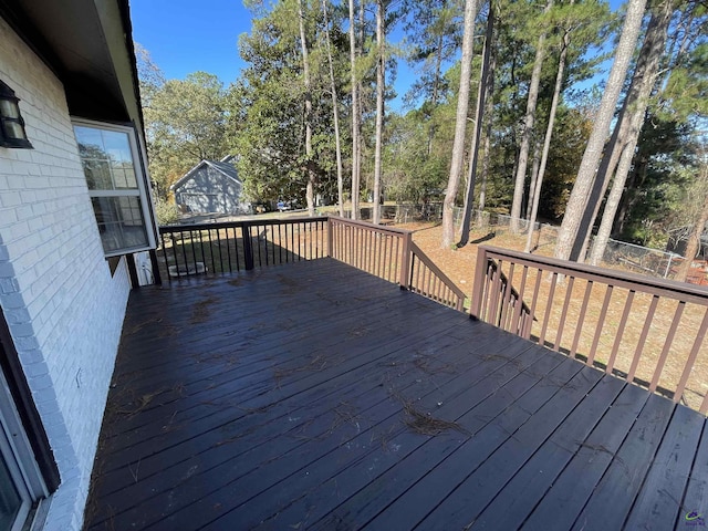 202 Lake Front Dr, Warner Robins, GA 31088 - deck with a fenced backyard and view of scattered trees