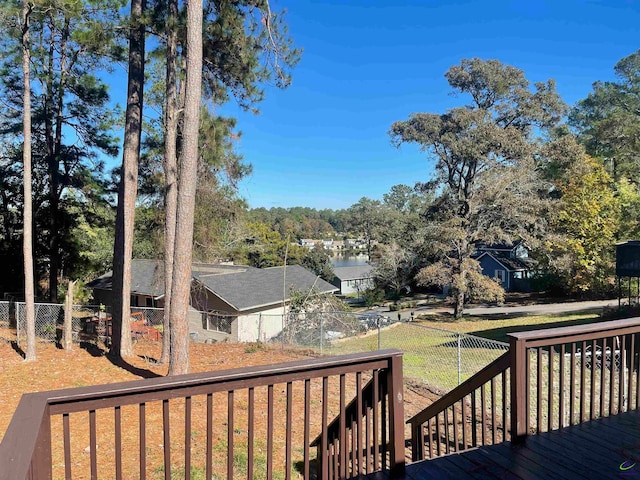 deck featuring a lawn